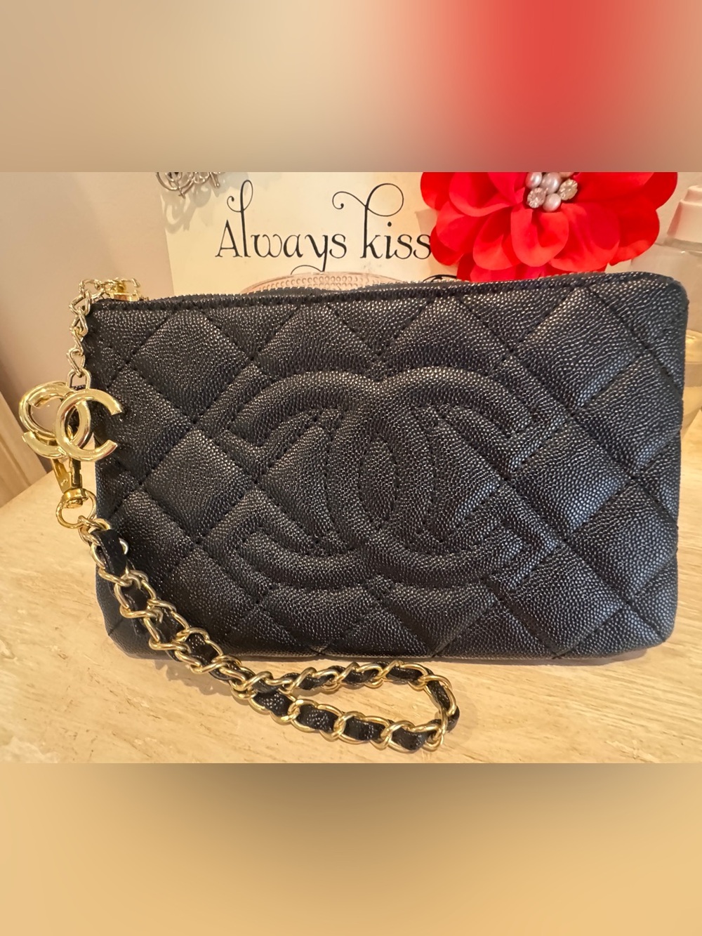 CHANEL Black Quilted Wristlet with Gold Chain Charm